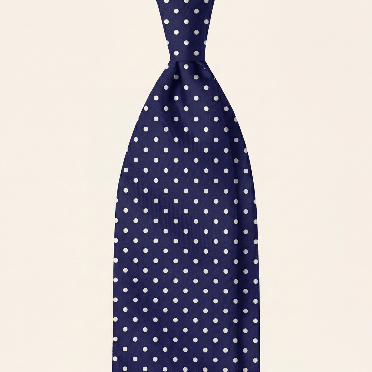 Navy 7-fold sartorial silk tie with white polka dots, handmade in Como by Lorenzi Como