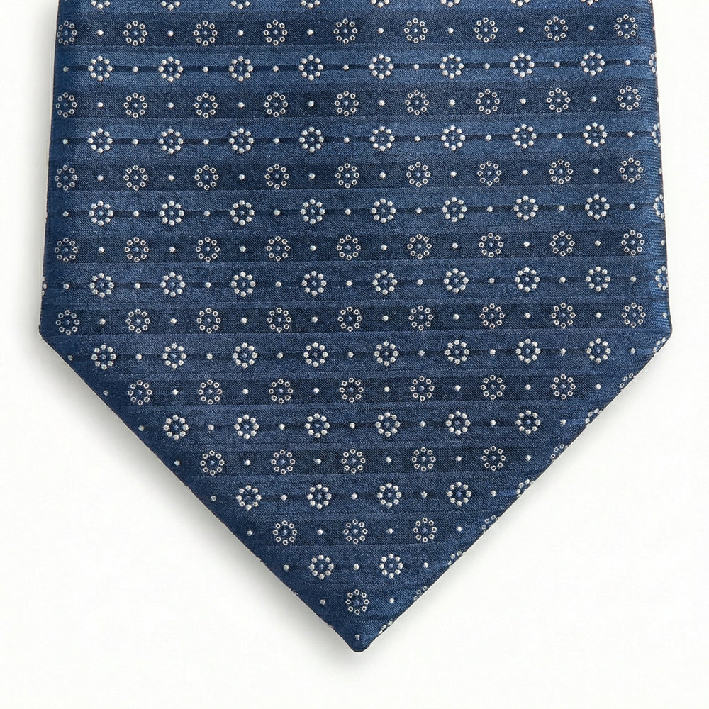 blue jacquard silk tie with circular geometric micro-pattern, made in Como, Italy
