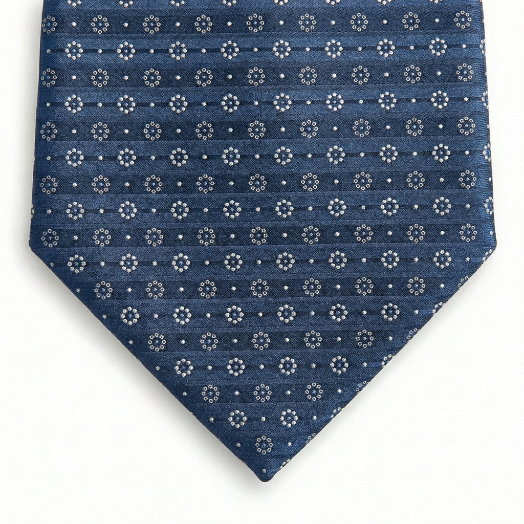 blue jacquard silk tie with circular geometric micro-pattern, made in Como, Italy