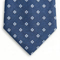 blue jacquard silk tie with small geometric foulard pattern, handmade in Como