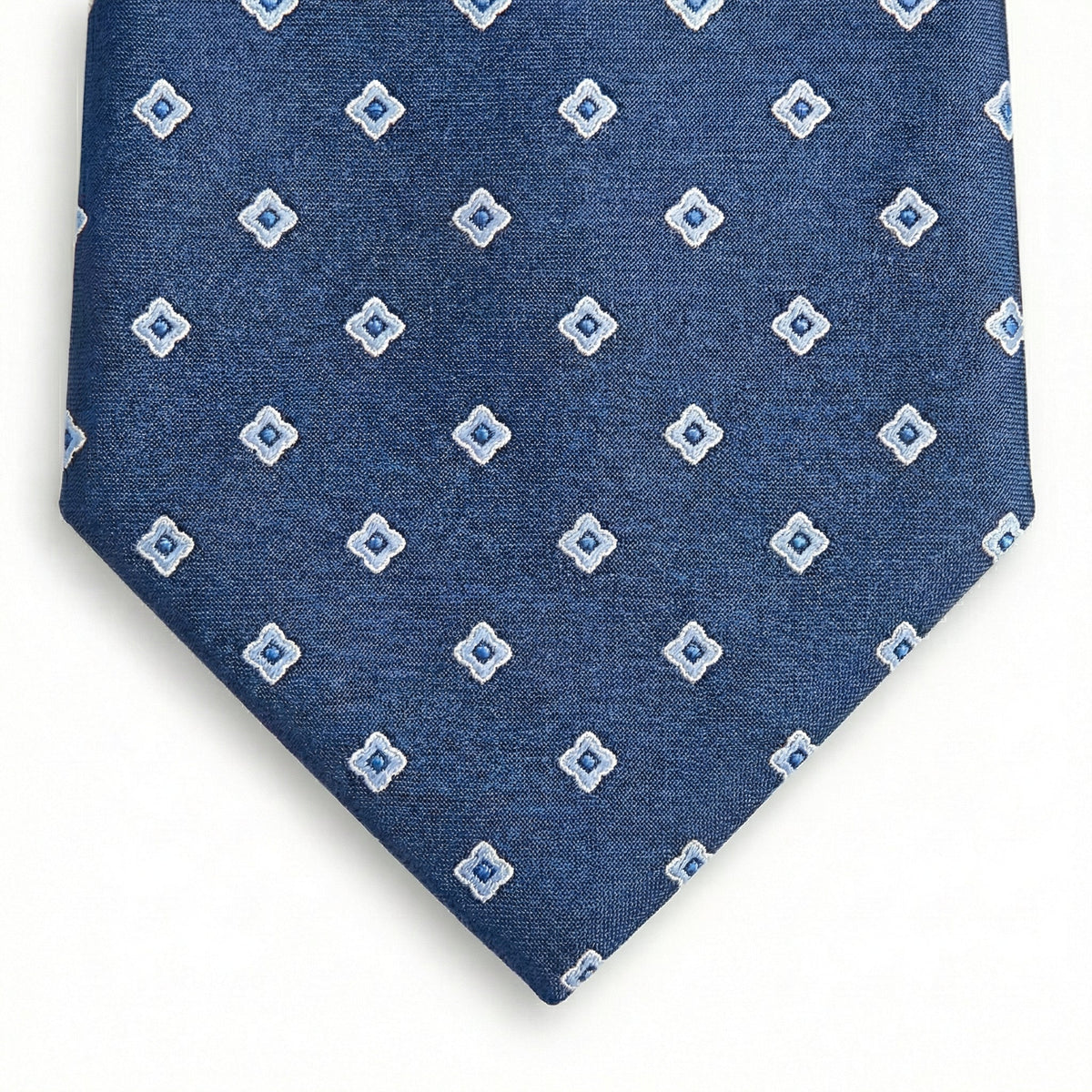 blue jacquard silk tie with small geometric foulard pattern, handmade in Como