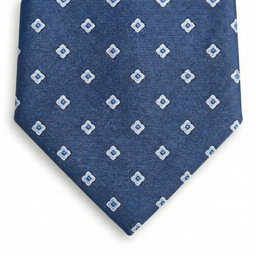 blue jacquard silk tie with small geometric foulard pattern, handmade in Como