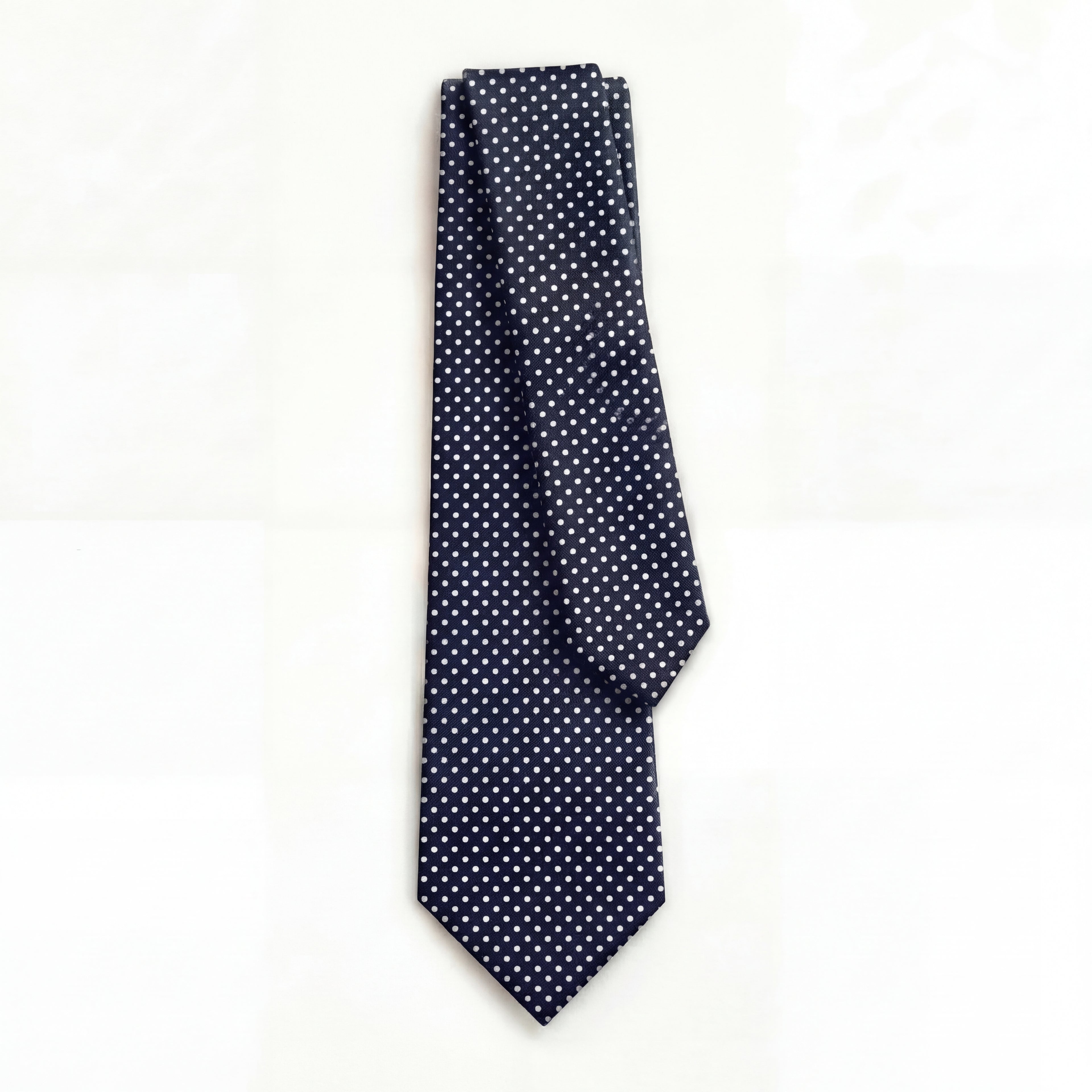 DARK BLUE 3 FOLD SARTORIAL SILK TIE - White Polka Dot, full tie displayed on white background
