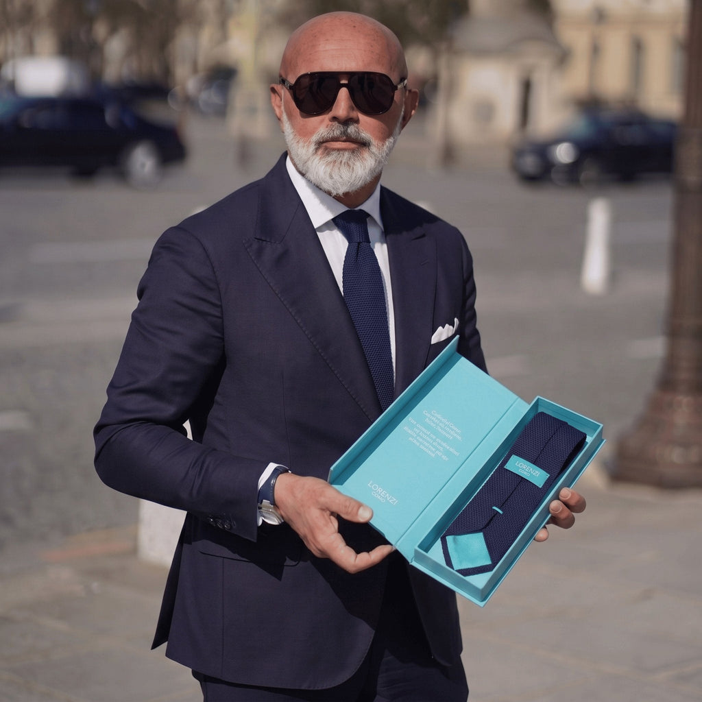 Luigi Contessi presenting The Contessi Edition, the navy grenadine tie in its Blu Lorenzi box