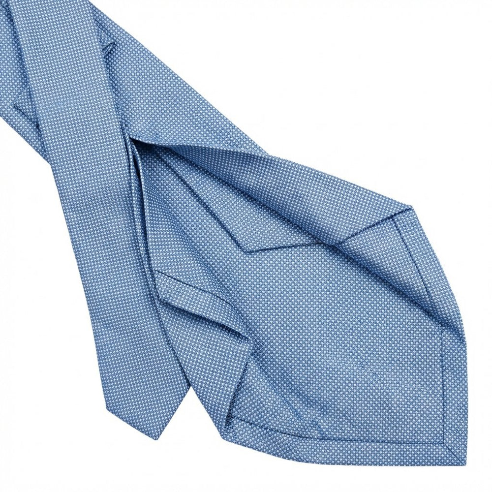 cravatta azzurro 5 pieghe in seta jacquard, tinta unita, fatta a mano a Como da Lorenzi Como
