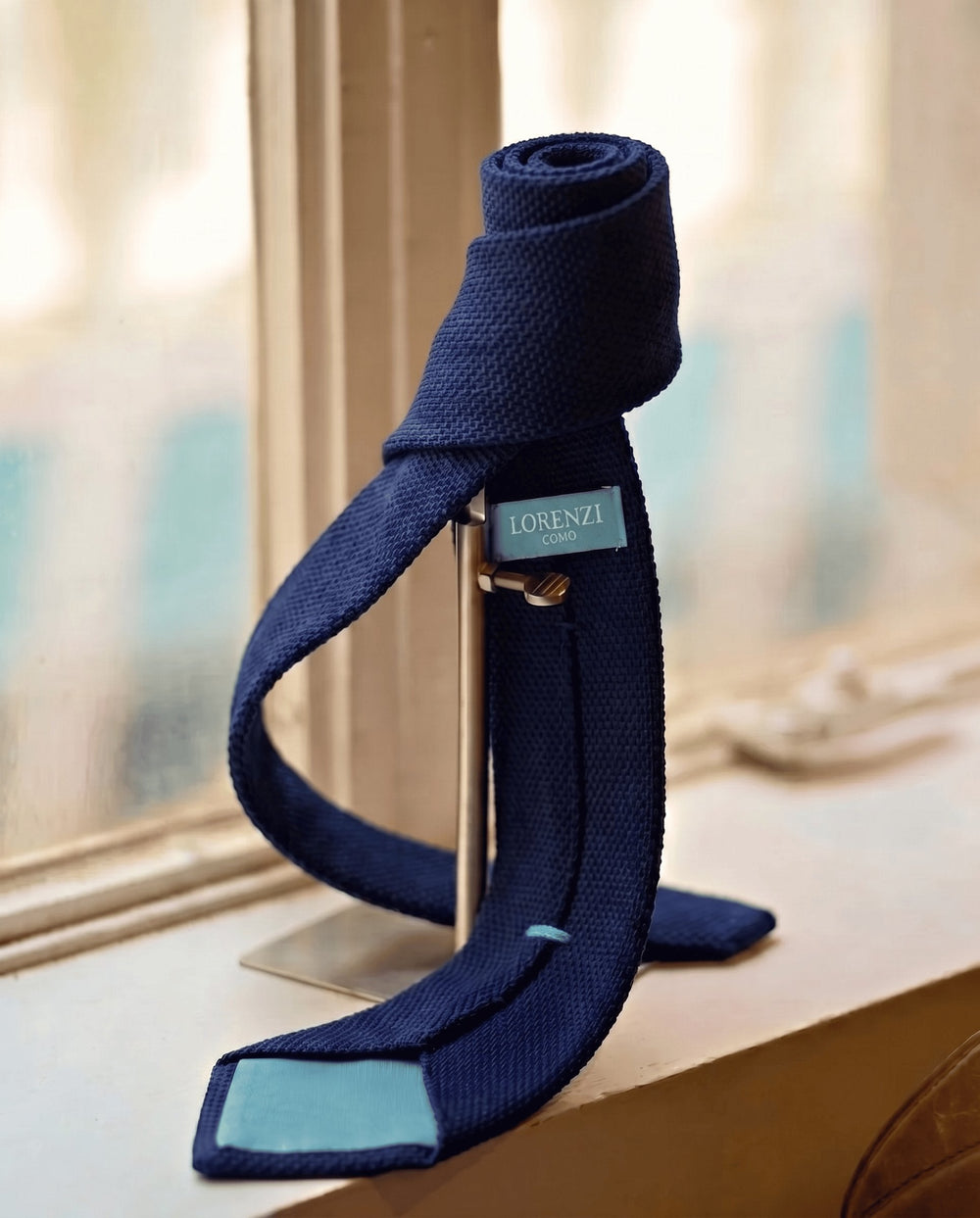 The Contessi Edition rolled: navy grenadine silk with Blu Lorenzi tipping and Lorenzi Como label